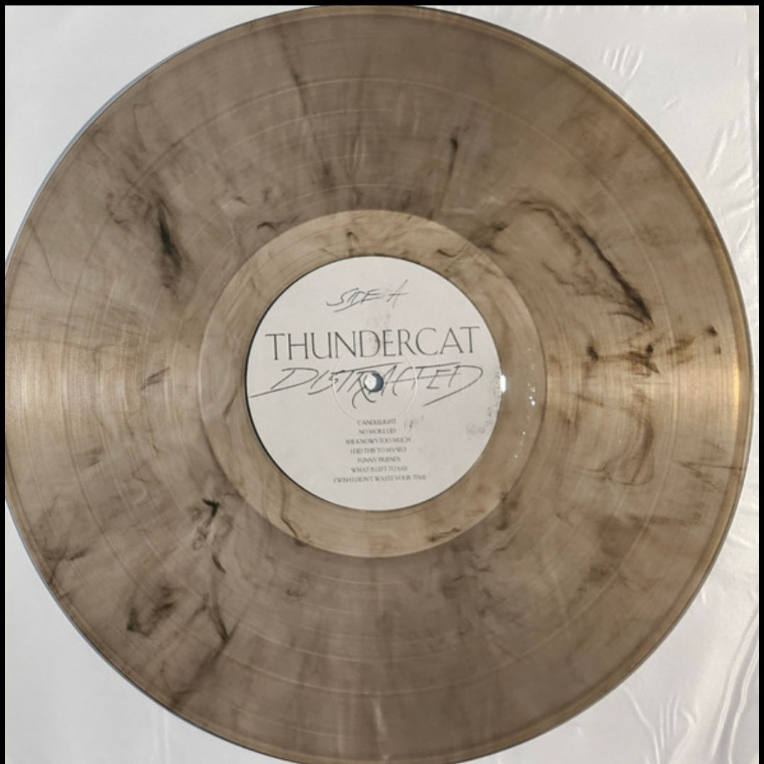 THUNDERCAT : DISTRACTED LTD LP 180G CLEAR BLACK MARBLED VINYL