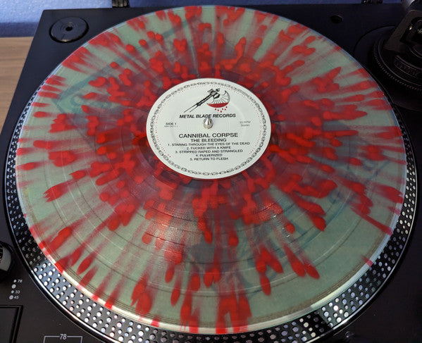 CANNIBAL CORPSE : THE BLEEDING LTD LP 180G COKE BOTTLE CLEAR WITH RED SPLATTER VINYL